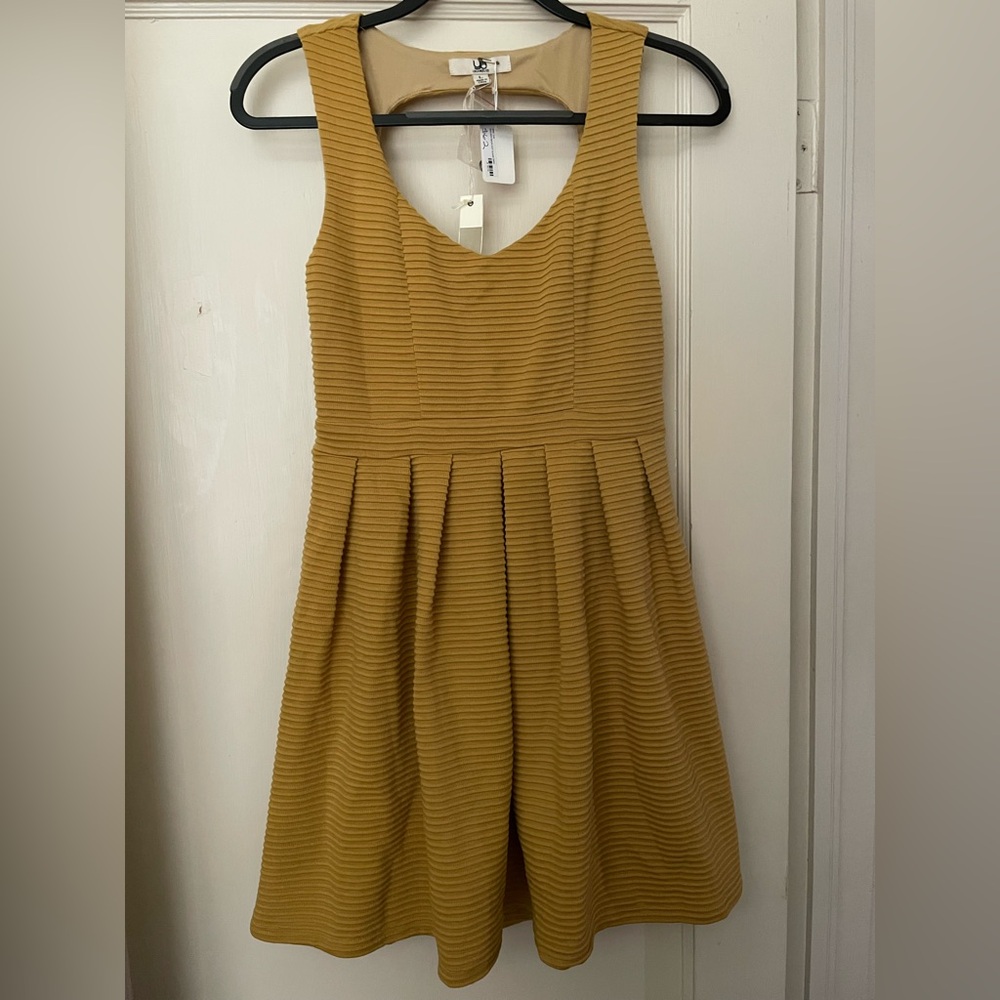 Ya Los Angeles: Yellow Pleated Dress